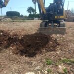 pozzetto esplorativo con benna meccanica